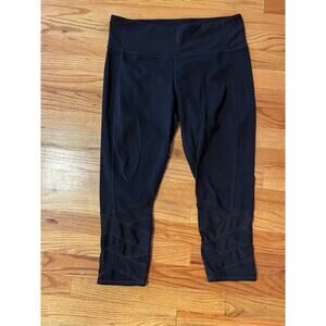 Athleta black mesh accent leggings mid calf length size large